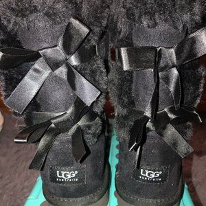 size 8 short black fuzzy Ugg boots with bows